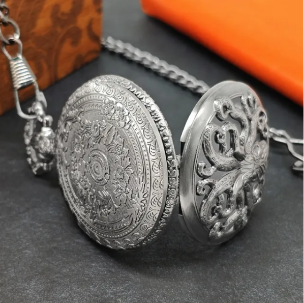 Mini metal cube with pocket watch-sized storage: Octopus